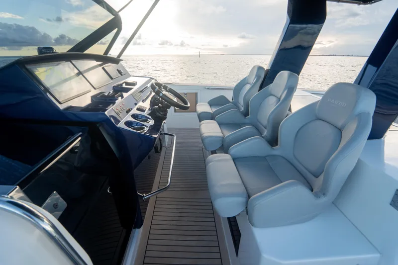 Slide: The Image of Luxurious 2021 Pardo Yachts 43 cockpit with plush seating and ocean view. - 19