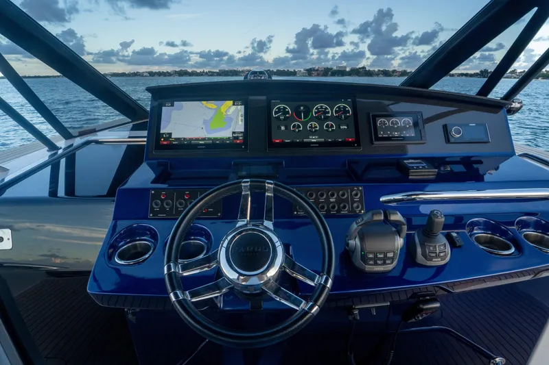 Slide: The Image of Cockpit of 2021 Pardo Yachts 43 with advanced navigation displays and controls. - 21