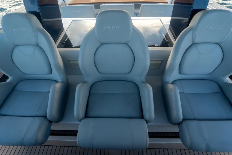 Slide: The Image of Luxury seating on 2021 Pardo Yachts 43, featuring three elegant, cushioned chairs. - 22