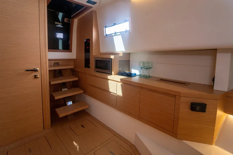 Slide: The Image of Luxurious interior of 2021 Pardo Yachts 43, featuring modern wood cabinetry and sleek design. - 31