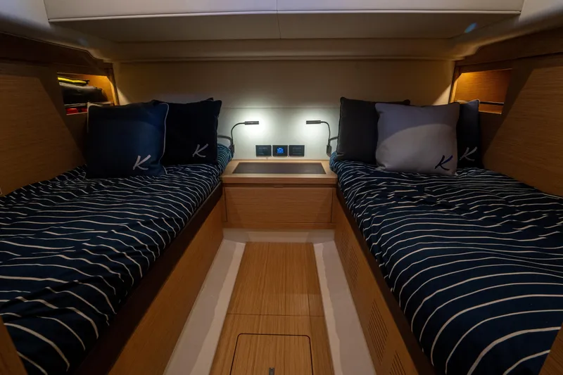 Slide: The Image of Interior cabin of 2021 Pardo Yachts 43 with twin beds and modern lighting. - 34