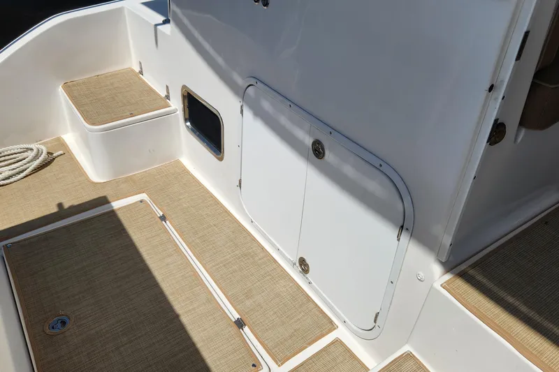 Slide: The Image of Deck area of 2003 Endeavour 44 TrawlerCat with storage compartments and rope. - 26