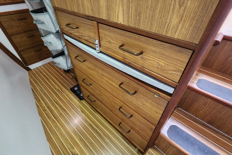 Slide: The Image of Wooden cabinetry and stairs inside a 2003 Endeavour 44 TrawlerCat boat. - 35