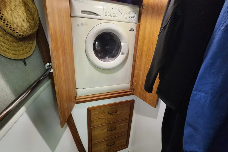 Slide: The Image of Laundry area with washing machine in 2003 Endeavour 44 TrawlerCat boat. - 36