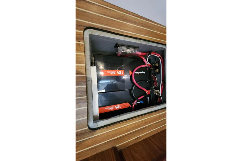 Slide: The Image of Battery compartment of a 2003 Endeavour 44 TrawlerCat with wiring and connections. - 46
