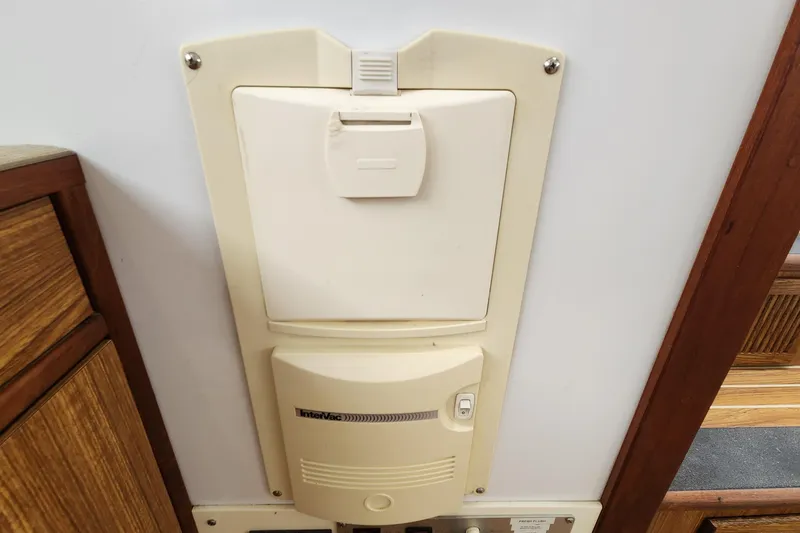 Slide: The Image of Built-in vacuum system on a 2003 Endeavour 44 TrawlerCat boat interior. - 48