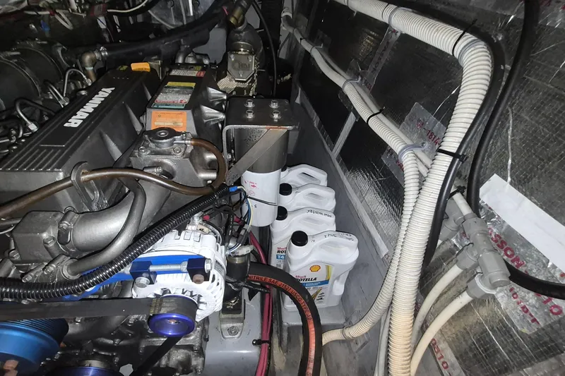 Slide: The Image of Engine room of 2003 Endeavour 44 TrawlerCat with Yanmar engine and oil containers. - 73