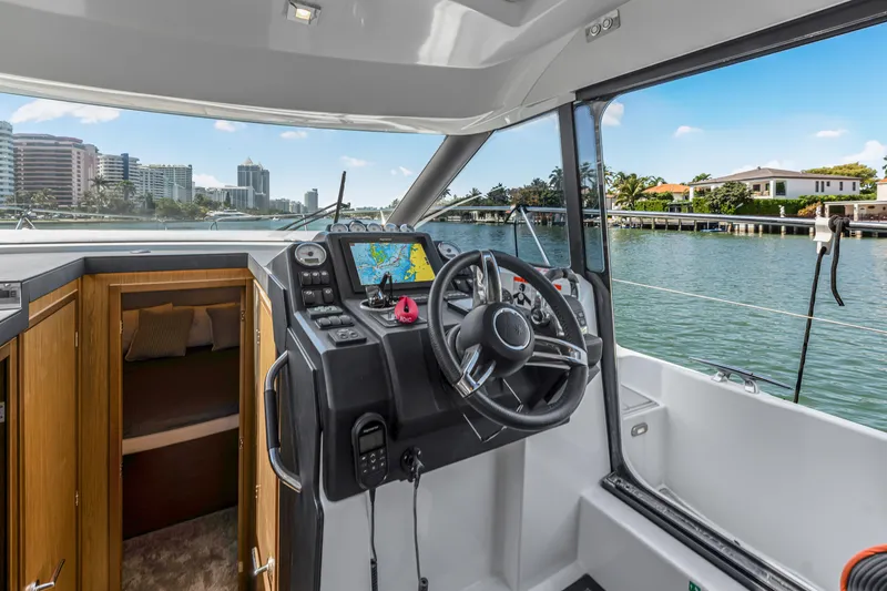 Slide: The Image of Interior view of 2020 Jeanneau NC 37 yacht cockpit with navigation system. - 15