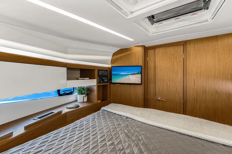 Slide: The Image of Luxurious interior of 2020 Jeanneau NC 37 yacht with modern amenities and elegant design. - 29