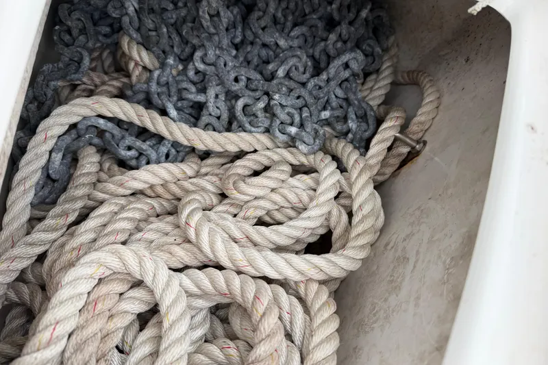 Slide: The Image of Rope and chain in a 2014 Ranger Tugs R-25 SC boat compartment. - 11