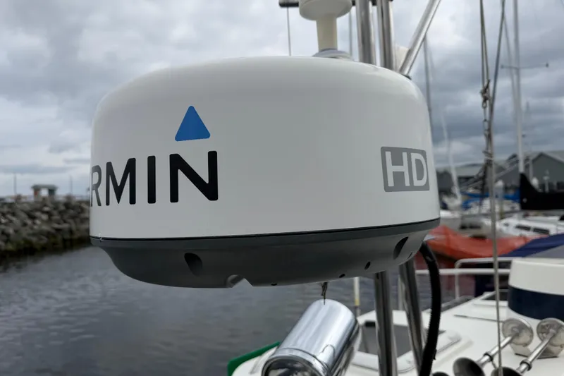 Slide: The Image of Garmin HD radar on 2014 Ranger Tugs R-25 SC boat, docked in a marina. - 13