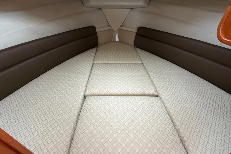 Slide: The Image of 2014 Ranger Tugs R-25 SC cabin interior with patterned upholstery. - 35