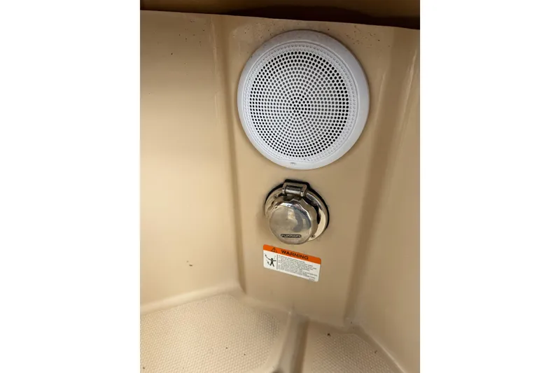 Slide: The Image of 2014 Ranger Tugs R-25 SC interior speaker and fuel cap detail. - 39