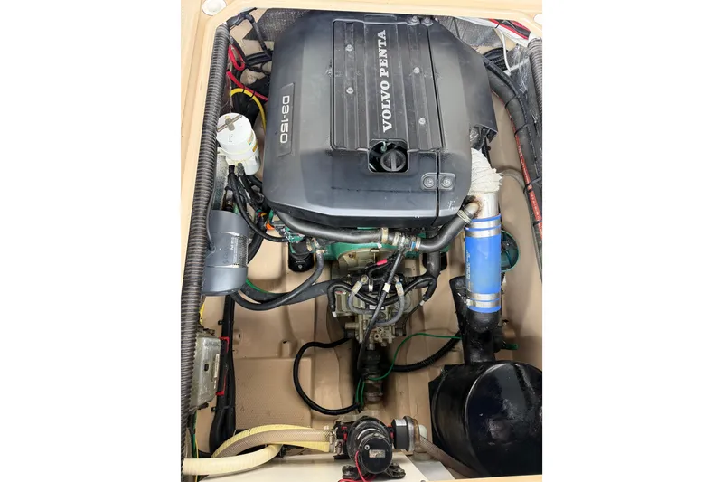Slide: The Image of Volvo Penta engine in 2014 Ranger Tugs R-25 SC boat, showcasing detailed components. - 45