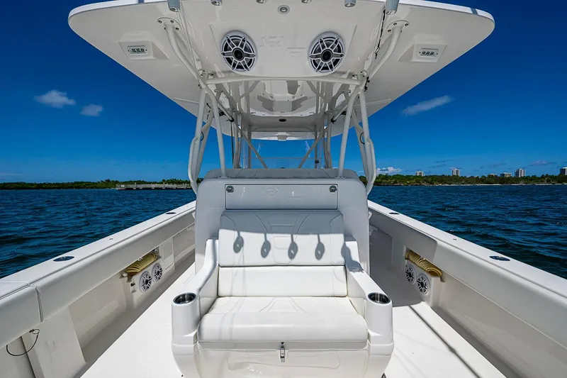 Slide: The Image of 2023 SeaVee 390B boat interior with seating, speakers, and ocean view. - 11