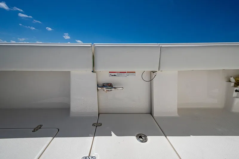 Slide: The Image of 2023 SeaVee 390B boat deck with clear blue sky background. - 19