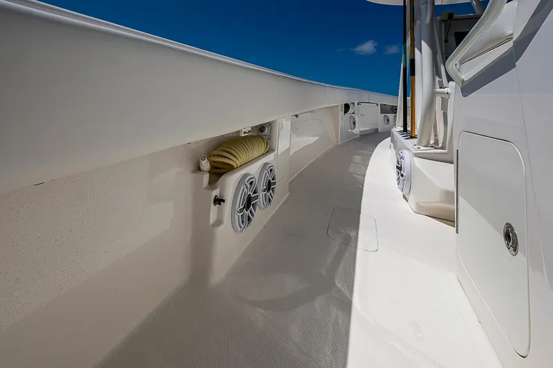 Slide: The Image of 2023 SeaVee 390B boat deck with speakers and storage compartments. - 20