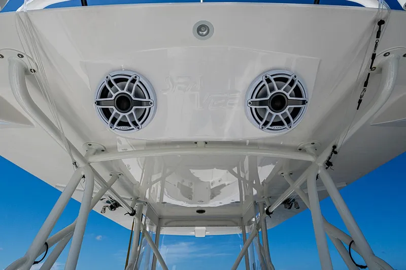 Slide: The Image of 2023 SeaVee 390B boat speakers and structure against a clear blue sky. - 29