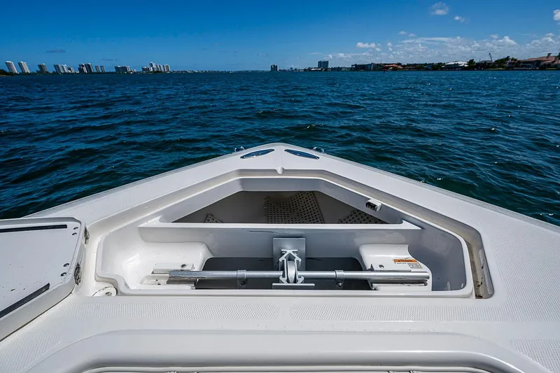 Slide: The Image of Bow view of 2023 SeaVee 390B boat on open water, clear sky. - 5