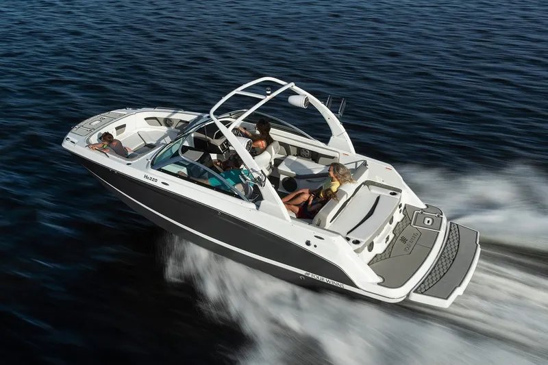 Slide: The Image of Manufacturer Provided Image: 2020 Four Winns HD220 boat cruising on open water. - 1