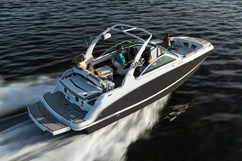 Slide: The Image of Manufacturer Provided Image: 2020 Four Winns HD220 boat cruising on water with passengers. - 2