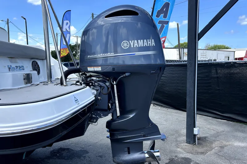 Slide: The Image of 2020 Four Winns HD220 boat with Yamaha four-stroke outboard motor. - 6