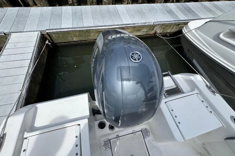 Slide: The Image of 2020 Tidewater 198 CC Adventure boat with Yamaha outboard motor docked at marina. - 25