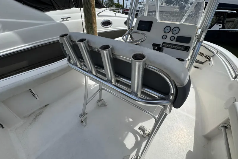 Slide: The Image of 2020 Tidewater 198 CC Adventure boat console with rod holders and steering wheel. - 5