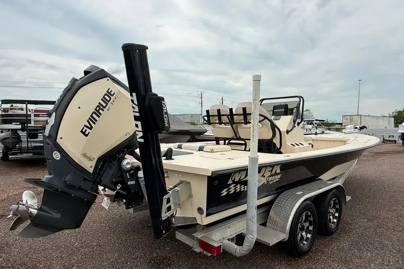 Slide: The Image of 2017 Majek 25 Xtreme boat with Evinrude engine on a trailer. - 5