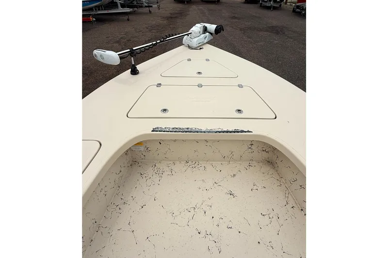 Slide: The Image of 2017 Majek 25 Xtreme boat deck with trolling motor, storage compartments visible. - 6