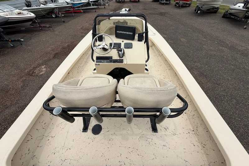 Slide: The Image of 2017 Majek 25 Xtreme boat interior with dual seats and steering console. - 9