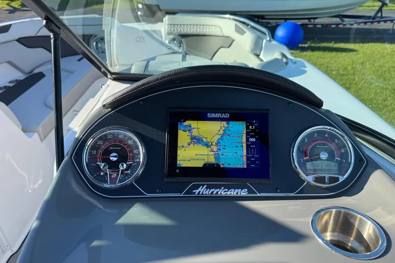 Slide: The Image of Dashboard of 2025 Hurricane SunDeck 2400 OB boat with navigation display. - 17