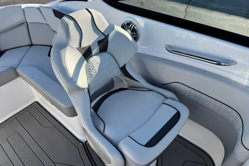 Slide: The Image of 2025 Hurricane SunDeck 2400 OB boat interior with modern seating and sleek design. - 22