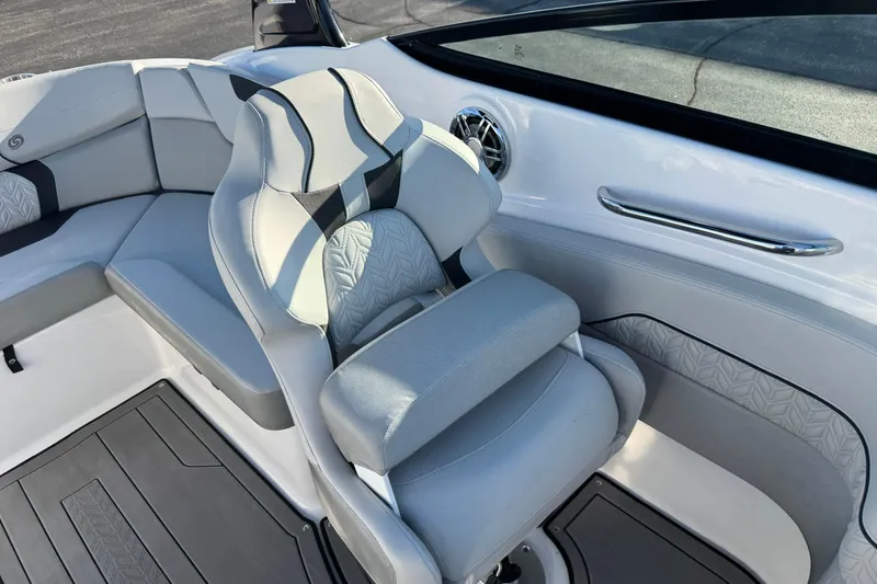 Slide: The Image of 2025 Hurricane SunDeck 2400 OB boat interior with stylish seating and modern design. - 23