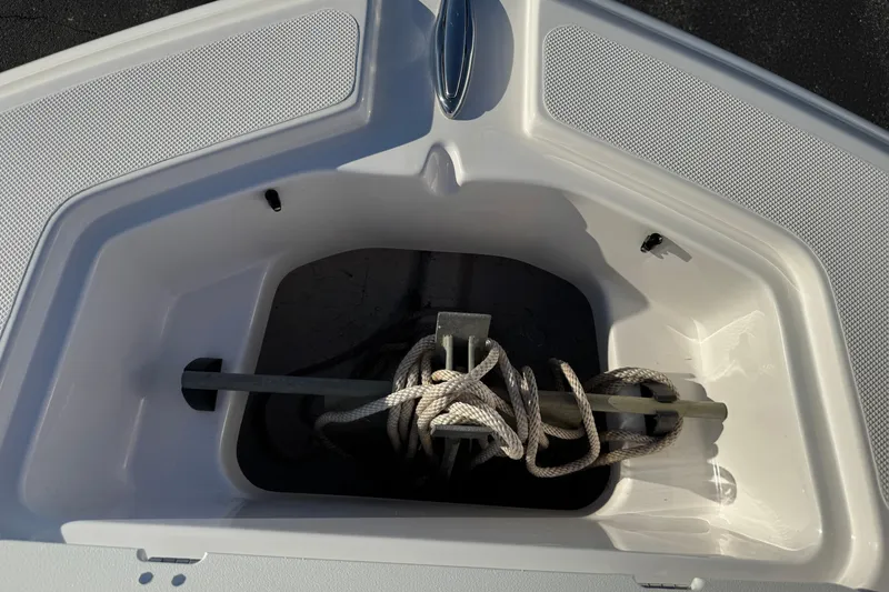 Slide: The Image of Anchor storage compartment on 2025 Hurricane SunDeck 2400 OB boat. - 27