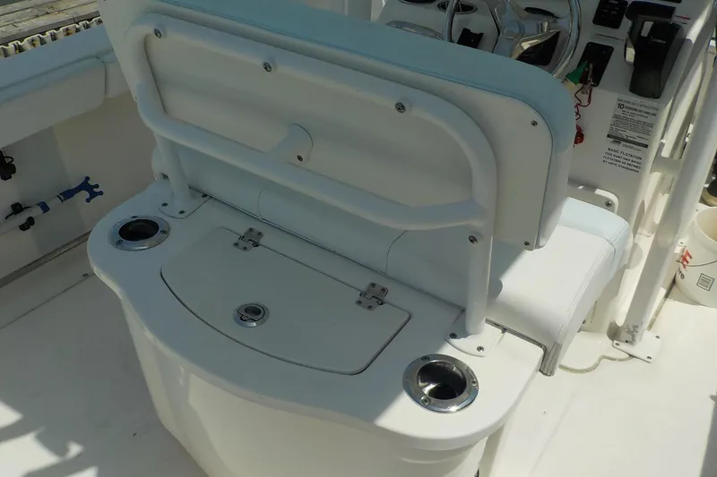 Slide: The Image of 2019 Robalo R222 Center Console boat interior with seating and steering wheel. - 10