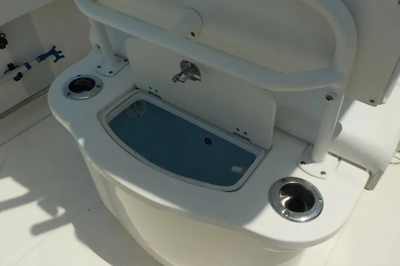 Slide: The Image of 2019 Robalo R222 Center Console boat with integrated sink and cup holders. - 12