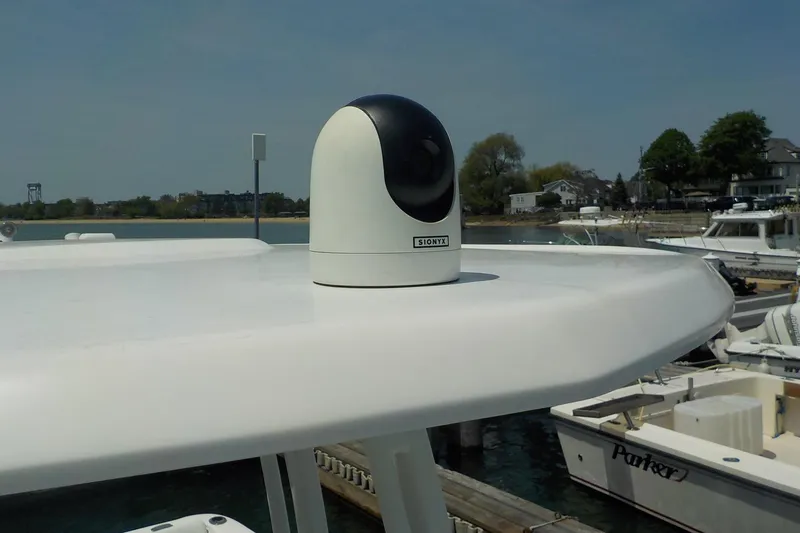 Slide: The Image of Robalo R222 Center Console 2019 with mounted Sionyx camera, docked at marina. - 13