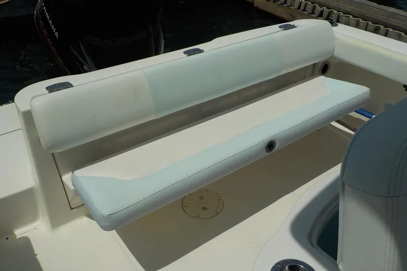 Slide: The Image of 2019 Robalo R222 Center Console boat with foldable rear seating. - 16