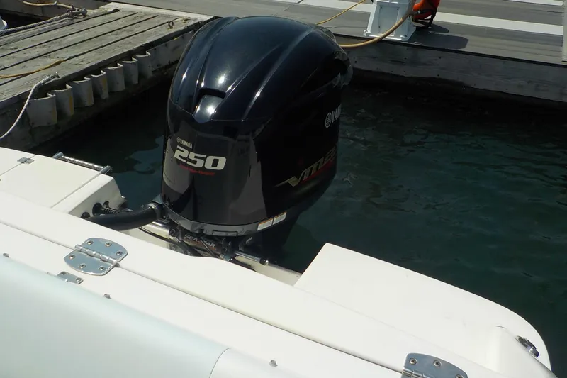 Slide: The Image of 2019 Robalo R222 Center Console with Yamaha 250 outboard engine at dock. - 20