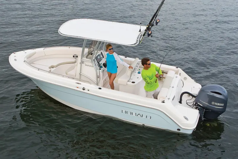 Slide: The Image of Manufacturer Provided Image: 2019 Robalo R222 Center Console boat on water with two people. - 27