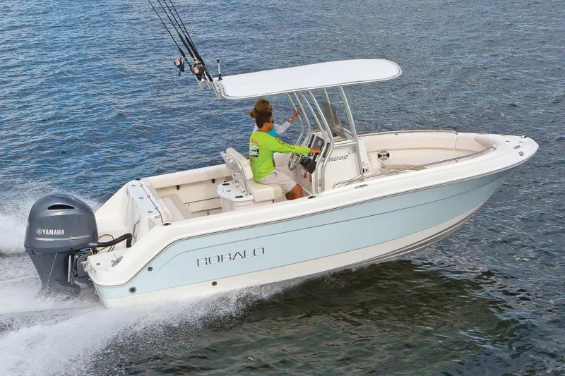 Slide: The Image of Manufacturer Provided Image: 2019 Robalo R222 Center Console boat cruising on water. - 28