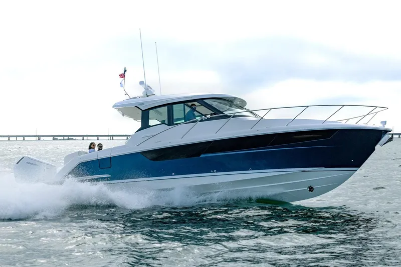 Slide: The Image of Manufacturer Provided Image: 2026 Tiara Yachts 39 LE cruising on water, showcasing sleek design and performance. - 1