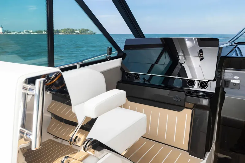 Slide: The Image of Manufacturer Provided Image: 2026 Tiara Yachts 39 LE helm with modern controls and ocean view. - 16