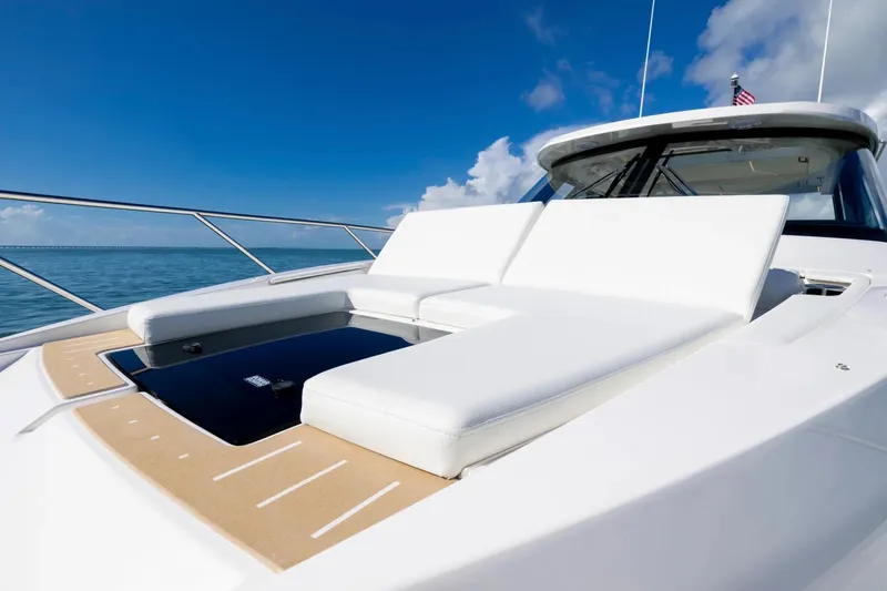Slide: The Image of Manufacturer Provided Image: 2026 Tiara Yachts 39 LE luxury yacht with sunbathing deck, cruising on open water. - 3