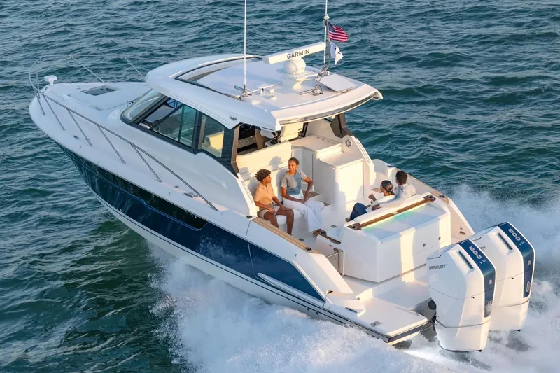 Slide: The Image of Manufacturer Provided Image: 2026 Tiara Yachts 39 LE cruising with passengers on a sunny day. - 4
