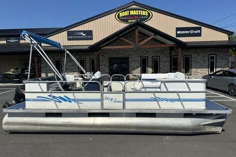 The Image of 2002 Playtime DL2022 pontoon boat parked outside Boat Masters dealership. - 0
