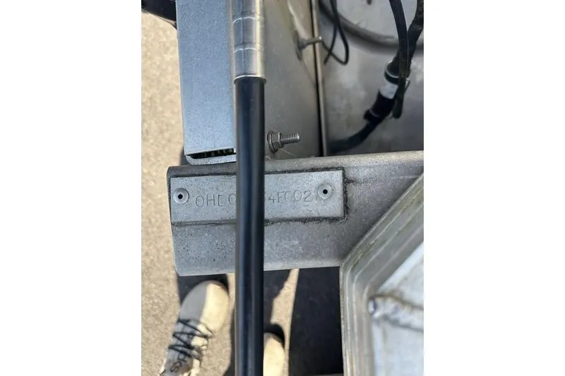 Slide: The Image of Close-up of Playtime DL2022 metal component with visible serial number, manufactured in 2002. - 8