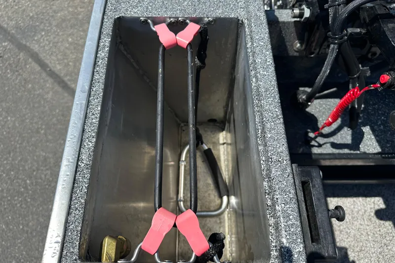 Slide: The Image of Interior view of Alumaweld Columbia 25 boat, showcasing storage compartment, 2024 model. - 19