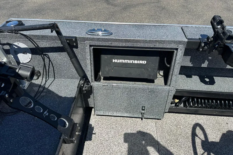 Slide: The Image of 2024 Alumaweld Columbia 25 boat with Humminbird electronics and fishing rod holders. - 6